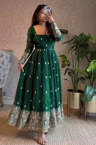 Dark green heavy flared wedding wear anarkali salwar kameez