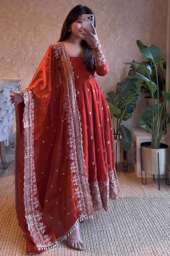Vibrant orange heavy border gher anarkali suit for women