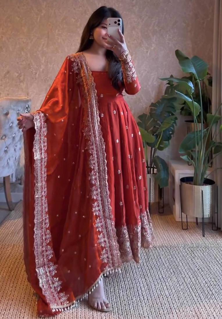 Vibrant orange heavy border gher anarkali suit for women