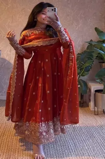 Vibrant orange heavy border gher anarkali suit for women