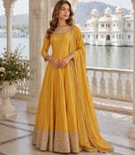 Yellow Viscos free size stitched jacquard anarkali suit with codding dori & sequence work