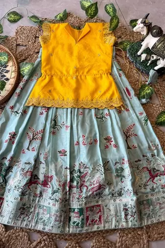 Girls yellow embroidered peplum top with position printed lehengha set