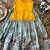 Girls yellow embroidered peplum top with position printed lehengha set