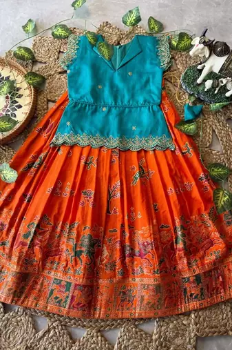 Girls firozi embroidered peplum top with position printed lehengha set