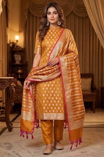 Banarasi cotton semi silk 3pcs unstiched dress material in rust orange colour with zari booti work