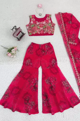 Rani pink colour tibby silk shrug sharara set with embroidered blouse