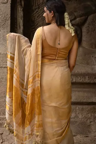 Ivory colour tissue linen cotton saree with running blouse