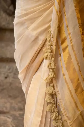 Ivory colour tissue linen cotton saree with running blouse