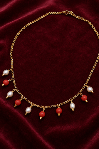 Gold-toned chain necklace with coral and pearl charm dangles, women's fashion jewellery
