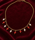 Gold-toned chain necklace with coral and pearl charm dangles, women's fashion jewellery