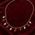 Gold-toned chain necklace with coral and pearl charm dangles, women's fashion jewellery