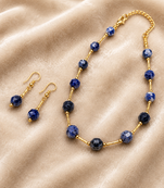 Sodalite beaded necklace and earring set, blue, faceted stone beads with gold-tone accents