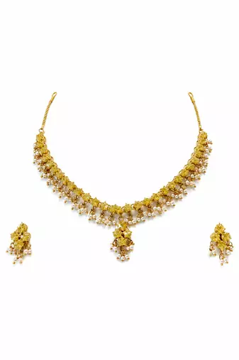 Gold-toned floral necklace and earrings set with pearl drops, traditional indian jewellery