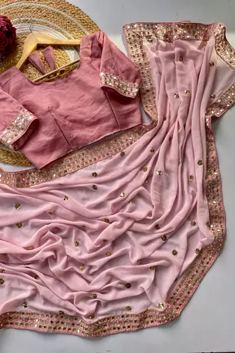 Pink color faux georgette mirror work saree