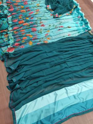 teal blue printed georgette saree with blouse 2