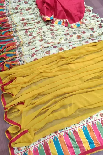 yellow printed georgette saree with blouse