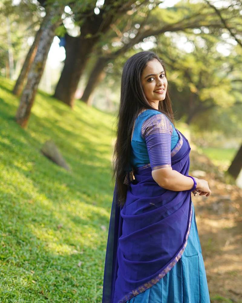 Bllue kanjivaram silk blend half saree with traditional gold zari weaving work