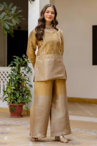golden viscose kurta set with embroidered sequins work