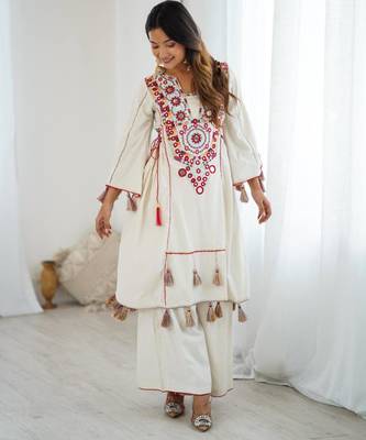 white pure cotton embroidered kurta set 1