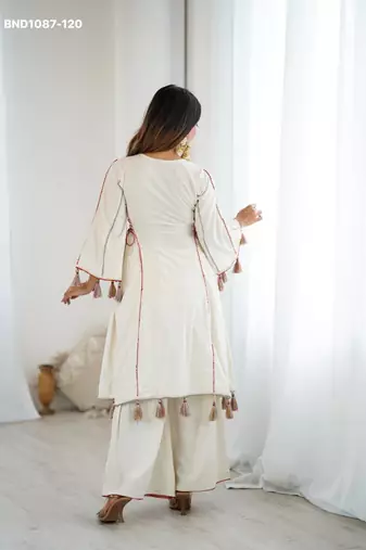 white pure cotton embroidered kurta set