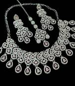 Baby pink rhodium-plated agate stone necklace set with earrings & maang tikka
