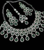 Green rhodium-plated agate stone necklace set with earrings & maang tikka