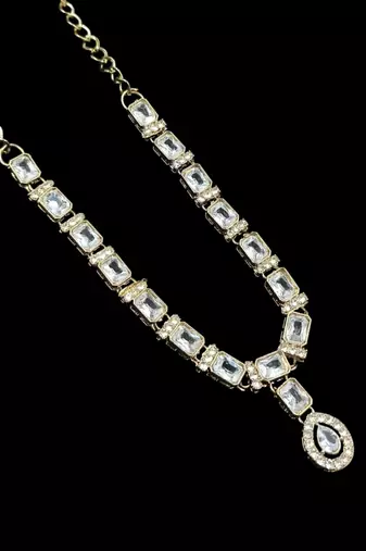 White color necklace set with earrings and maang tikka     agate stone, antique gold plating