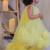 Yellow pompom net gown
