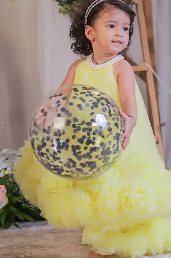 Yellow pompom net gown