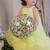 Yellow pompom net gown