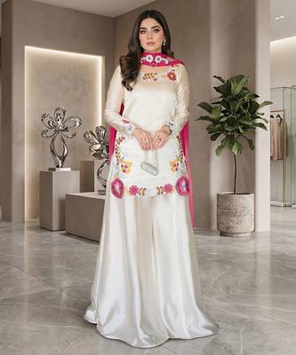 Elegant ivory silk sharara suit set with vibrant floral embroidery 1