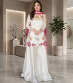 Elegant ivory silk sharara suit set with vibrant floral embroidery