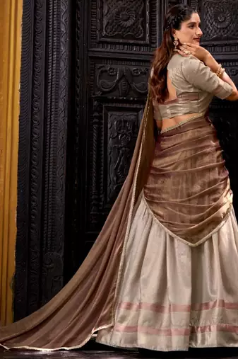 beige art silk woven lehenga choli