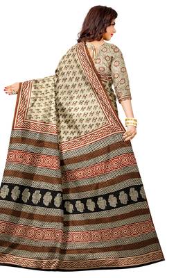 Crem ethnic printed saree 3