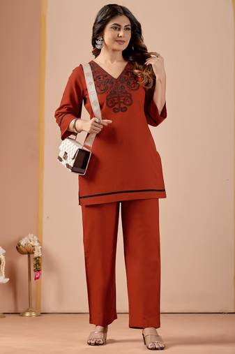 Women's rust-orange embroidered v-neck kurti pant set