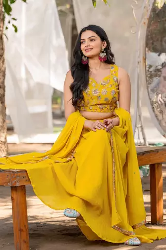 Yellow Georgette Embroidered Sequinned Flared Lehenga Choli with Dupatta and Blouse