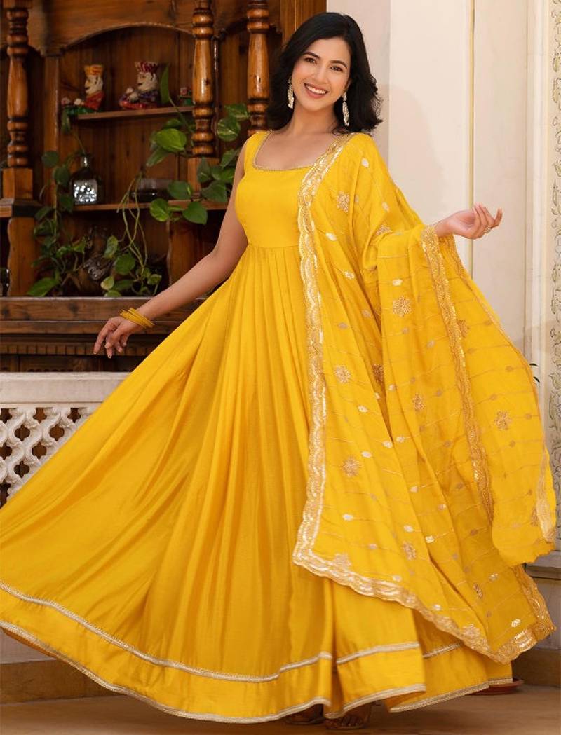 Yellow plain silk stitched anarkali kurta set with dupatta