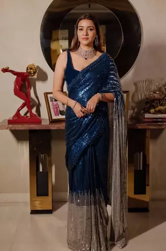 Blue color heavy georgette sequin work saree with cutwork border