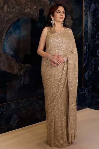 Gold color faux georgette rainbow sequin embroidered saree with silk blouse