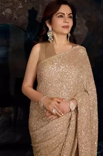 Gold color faux georgette rainbow sequin embroidered saree with silk blouse