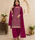 Rani pink embroidered georgette salwar suit with dupatta