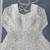 White faux georgette thread & sequin embroidered suit set
