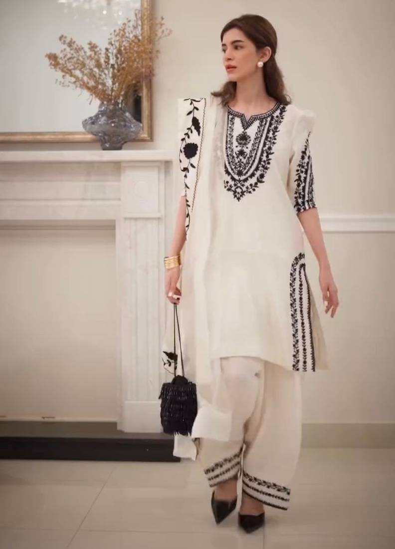White colour natural crepe embroidered farshi suit set with organza dupatta