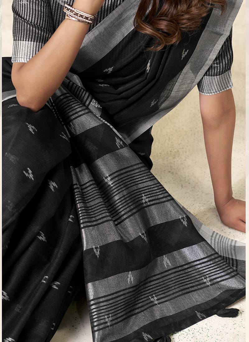 Black linen cotton saree with silver zari border & woven buti design