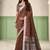 Brown linen cotton saree with silver zari border & woven buti design