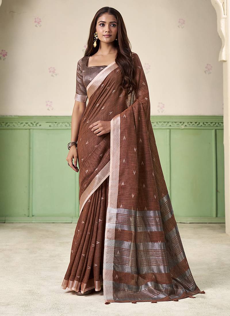 Brown linen cotton saree with silver zari border & woven buti design