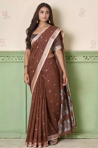 Brown linen cotton saree with silver zari border & woven buti design