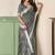 Grey linen cotton saree with silver zari border & woven buti design
