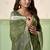 Olive linen cotton saree with silver zari border & woven buti design