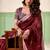 Maroon linen cotton saree with silver zari border & woven buti design